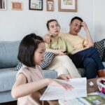 parents thinking while their child is busy doing something